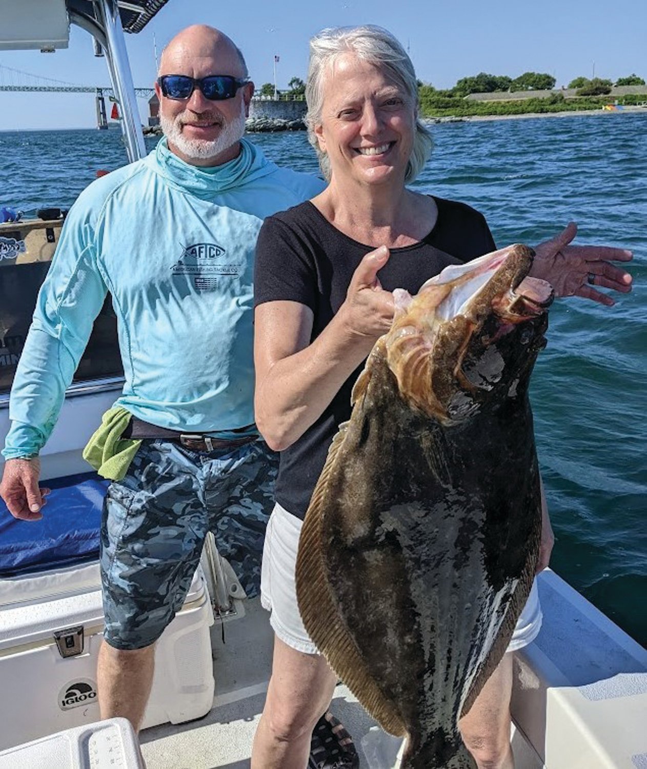 BIG FLUKE: Janet Coit, Assistant Administrator for NOAA Fisheries (and former RI DEM Director and Barrington resident), caught this 29” fluke Saturday when fishing with Greg Vespe, Tiverton, RISAA’s Executive Director.